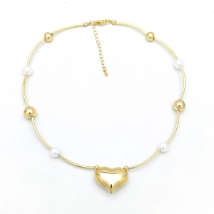 Elegant gold heart pendant necklace featuring white pearls and beads on a sleek chain