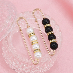 Elegant pearl and black bead waist pins with golden rhinestone spacers for clothing decor