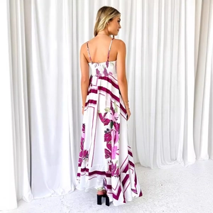 Back view of a summer boho maxi dress with floral print and adjustable thin straps