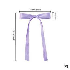 Purple satin bow hair clip with double streamers and detailed size specifications