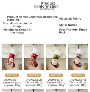 Detail view of large red fabric Christmas stockings with snowman and reindeer patterns