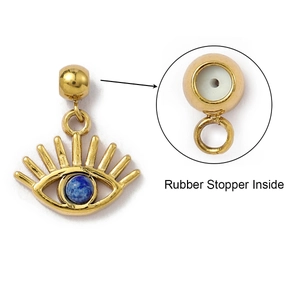 Macro view of gold evil eye pendant showing the rubber stopper inside for DIY adjustment