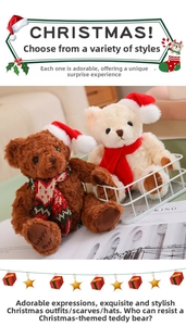 Detail of plush Christmas teddy bears with holiday hats and Happy Bear embroidery