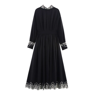 Elegant black long-sleeve shirt dress with white floral embroidery on collar and hem