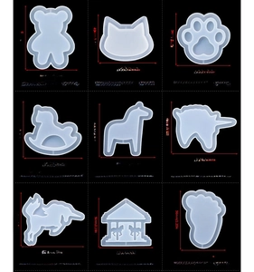 Detail view of animal-shaped silicone shaker molds with precise dimensions and weight