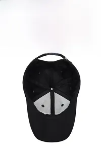 Detail of black baseball cap showing breathable mesh lining and inner cotton structure