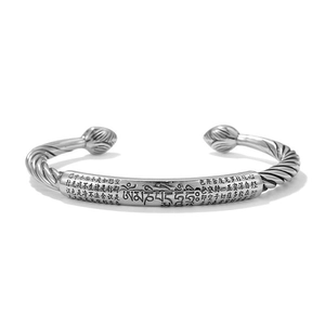 Vintage silver bangle with Heart Sutra and Six-Syllable Mantra on twisted metal cuff