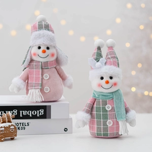 Charming set of two plush Christmas snowmen in pink and green outfits for home decor