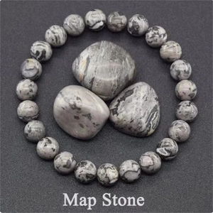 Detail of natural Map Stone beaded bracelet with matching polished gray marble stones