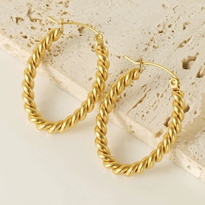 Golden twisted rope oval hoop earrings in polished stainless steel for women