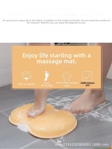 Detail showing soft silicone bristles and non-slip suction cups of the orange foot massager