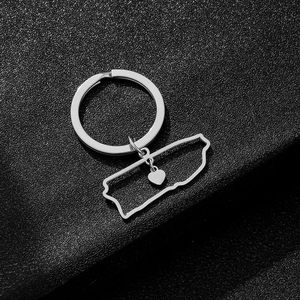 Detailed view of silver stainless steel keychain with heart and Pennsylvania state charm