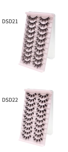 Detail view of 10 pairs thick curly false eyelashes set DSD21 and DSD22 on pink stand