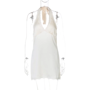 Detail of white silk-feel halter nightdress featuring delicate lace trims and open back