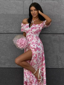 Detailed view of off-shoulder floral dress with high side slit and neck ties