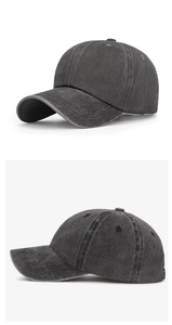 Dual-angle view of a vintage washed dark grey baseball cap with textured coating