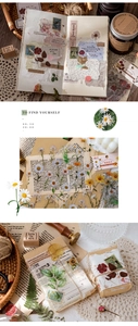 Detail of vintage daisy PET stickers for scrapbooking with floral nature motifs