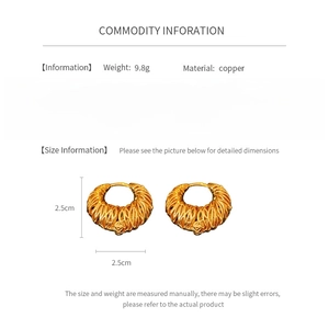Detail view of 18k gold plated hollow hoop earrings with size and weight specs