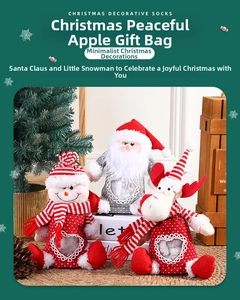 Three Christmas gift bags featuring Santa, snowman and elk with heart-shaped window