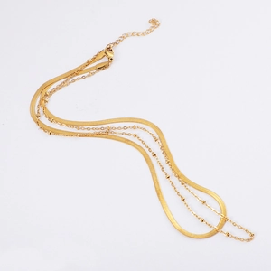 Double-layered gold stainless steel necklace with flat snake chain and beaded link design