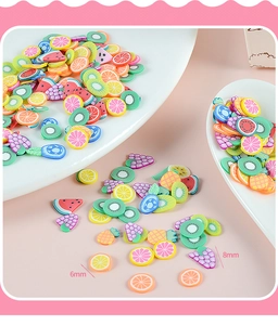 Detailed view of 6mm and 8mm fruit polymer clay slices for DIY jewelry and nail art