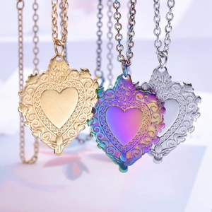 Vintage baroque heart pendant necklaces in gold, silver, and rainbow stainless steel