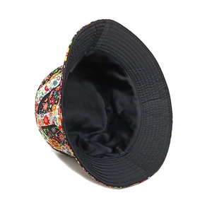 Geometric retro floral bucket hat with colorful prints and black inner lining for sun protection