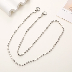 Detailed view of silver metallic ball chain strap with two circular spring ring clasps