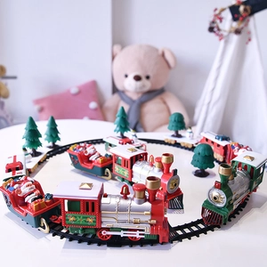 Vintage Christmas electric train set with Santa Claus on track for holiday decoration