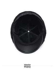 Detail view of thickened thermal fleece lining and hexagonal stitching inside the black cap