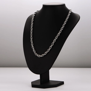 7.5mm silver stainless steel rope chain necklace displayed on a professional black bust