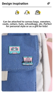 Detail of retro music enamel pins on a blue canvas bag featuring tape and record player