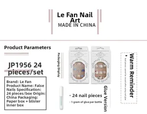Detailed set of short blue floral and white polka dot press-on nails with adhesive glue
