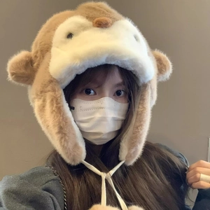 Cute brown plush monkey trapper hat for women with long earflaps and fluffy pom-poms