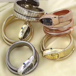 Elegant snake-shaped wrap watch with rhinestone bezel in gold, silver and rose gold
