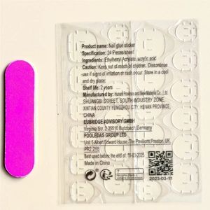 Close-up of 24pcs nail adhesive tabs with mini pink file for press-on nails