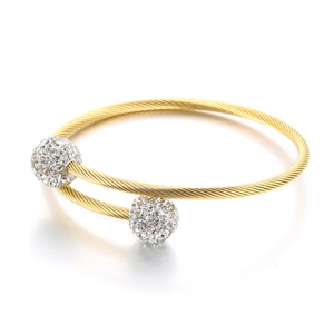 Golden woven cable open bangle featuring two spheres pavé-set with white crystals