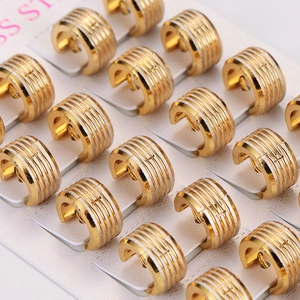 12 pairs of ribbed stainless steel hoop earrings in gold and silver finish on a display card