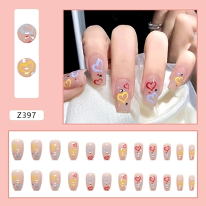 Pink sheer press-on nails with colorful heart patterns and rhinestones 24pcs kit
