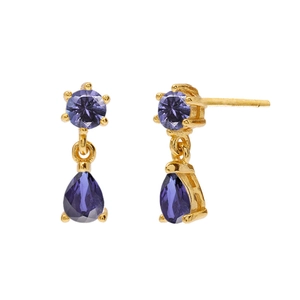 Detailed shot of gold earrings featuring purple zircon stones in round and teardrop shapes