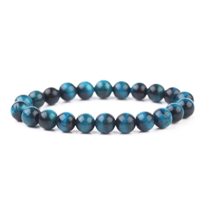 Macro shot of 8-10mm blue tiger eye natural stone beads showing chatoyant silky luster