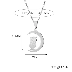 Stainless steel owl on moon pendant necklace with dimensions 3.5cm x 2cm and 50cm chain