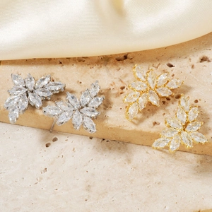 Elegant leaf-shaped cluster stud earrings with marquise-cut zircons in gold and silver