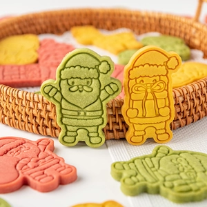 Christmas cookie cutters set featuring Santa and gift box designs for festive baking