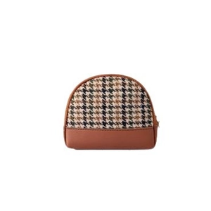 Mini canvas houndstooth coin purse with brown leather bottom and gold zipper closure