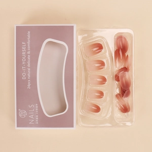 Short minimalist blush gradient press-on nails set with 24 pieces in purple packaging