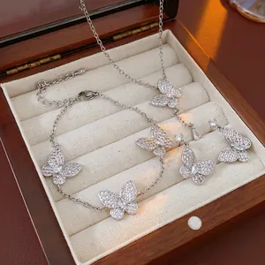 Silver butterfly jewelry set with zircon necklace bracelet and earrings in a wooden box