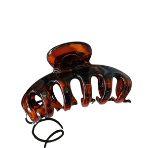Large amber tortoise shell hair claw clip for women with French vintage resin floral design