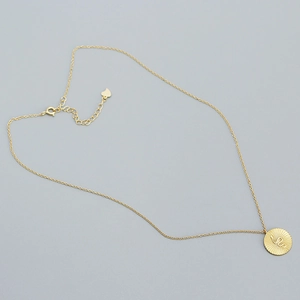 Golden S925 silver coin necklace featuring a radial texture and minimalist snake pendant