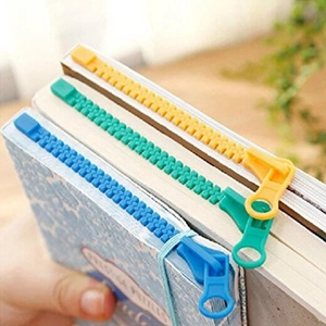 Creatieve bladwijzers in de vorm van een rits in geel, groen en blauw voor boeken